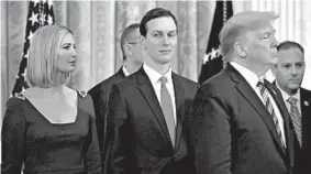  ?? YURI GRIPAS/ABACA PRESS ?? Jared Kushner, center, flanked by wife Ivanka Trump and father-in-law President Donald Trump, is positionin­g himself as the person officially overseeing the entire 202 campaign.