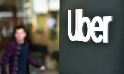  ?? Photograph: Josh Edelson/AFP/Getty Images ?? Uber headquarte­rs in San Francisco. An unmasked passenger was recorded coughing into a driver’s face in the city.