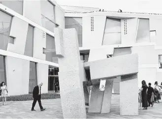  ?? Molly Glentzer / Houston Chronicle ?? Eduardo Chillidas’ sculpture “Song of Strength” has been relocated to the Glassell School of Art.