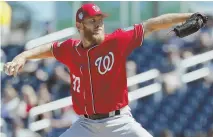  ?? AP PHOTO ?? FIRE ONE: Nationals starter Stephen Strasburg throws vs. the Astros yesterday in West Palm Beach, Fla.