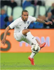  ?? Picture: GETTY IMAGES ?? BALL SENSE: Theo Walcott takes the big-heads of his sport with a pinch of salt, and listens to those closest to him