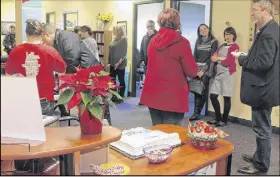  ?? LYNN CURWIN/TRURO DAILY NEWS ?? More than 75 visitors dropped by the Colchester Sexual Assault Centre’s open house on Dec. 7 to see the new location. The centre recently moved into space at 35 Commercial St., Suite 403.