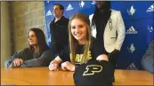  ?? NWA Democrat-Gazette/FLIP PUTTHOFF ?? Skylurr Patrick smiles Wednesday during her signing ceremony at Rogers High School. Patrick will play soccer at Purdue University.