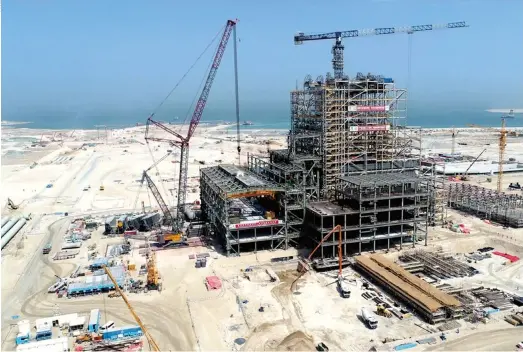  ??  ?? The constructi­on site of the Hassyan Clean Coal Power Plant, funded by the Silk Road Fund, in Dubai on June 19