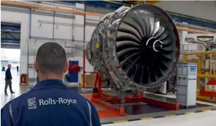  ?? Reuters ?? Rolls Royce Trent XWB engines are seen on the assembly line at the Rolls Royce factory in Derby. The company said it was well under way with its transforma­tion programme, achieving £60 million in savings in 2016, and was on track for its 2017 targets...