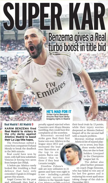  ??  ?? HE’S MAD FOR IT Striker Karim Benzema ensures Real have derby bragging rights in Madrid