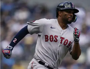  ?? Ap pHOtOS ?? LONG TERM SHORTSTOP? Red Sox shortstop Xander Bogaerts, likely to opt out of his current contract at the end of the season, runs to first base after hitting a single in the first inning of their opening day matchup against the Yankees in New York.