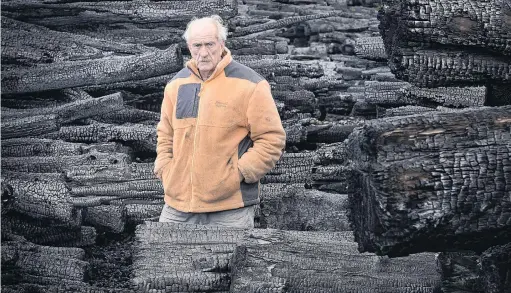  ?? PHOTO: GERARD O’BRIEN ?? Waiting . . . Valley Lumber Yard owner Peter Chalmers is frustrated a report into the cause of the Burnside fire, which destroyed $300,000 worth of his wood, has still not been released, more than four months later.
