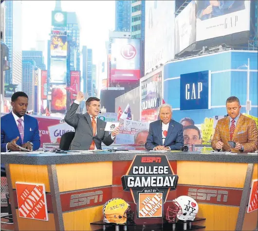  ?? MIKE STOBE/GETTY ?? “College GameDay” has been a popular staple for college football fans for years. “We’re still determinin­g what ‘GameDay’ would look like this season,” ESPN’s Lee Fitting told The AP.