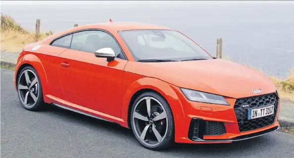  ??  ?? The 2019 Audi TTS — the TT stands for Tourist Trophy — feels fast and secure making its way through the Isle of Man’s Mountain Course, site of the world-famous motorcycle race.