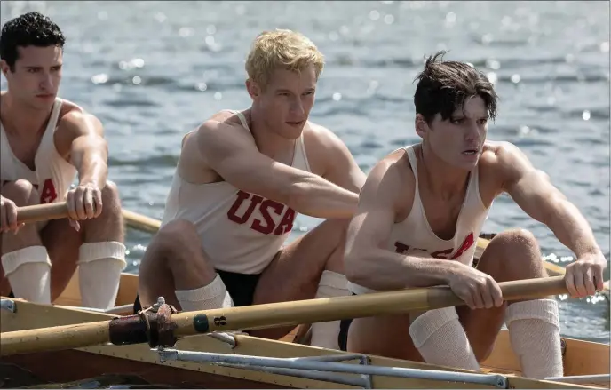  ?? PHOTO LAURIE SPARHAM — AMAZON/MGM STUDIOS ?? Bruce Herbelin-Earle stars as Shorty Hunt, Callum Turner as Joe Rantz and Jack Mulhern as Don Hume, l-r, in director George Clooney’s “The Boys in the Boat.”