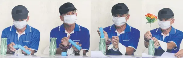  ?? PHOTOS BY APICHIT JINAKUL ?? Retired engineer Watana Pumret, suspected of being behind a bomb blast at Phramongku­tklao Hospital, demonstrat­es how he allegedly placed a pipe bomb into a flower vase to carry out the attack during a news conference at the Royal Thai Police...