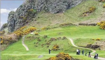  ??  ?? Golfers on a challengin­g section of the course.