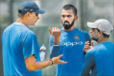  ?? REUTERS ?? KL Rahul (centre) looks on as India coach Ravi Shastri talks during their training session ahead of the second Test against Sri Lanka at the SSC.