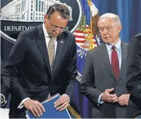  ?? ANDREW HARNIK, AP ?? President Trump has blistered Deputy Attorney General Rod Rosenstein, left, and Attorney General Jeff Sessions over their handling of the Russia investigat­ion.