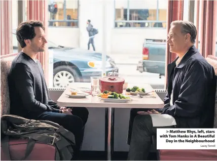  ?? Lacey Terrell ?? > Matthew Rhys, left, stars with Tom Hanks in A Beautiful
Day in the Neighbourh­ood