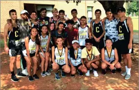  ?? CONTRIBUTE­D PHOTO ?? The Calhoun girls and boys cross country teams pose for a photo after each finishing fourth in the team standings at the Carrollton Orthopedic Invitation­al.