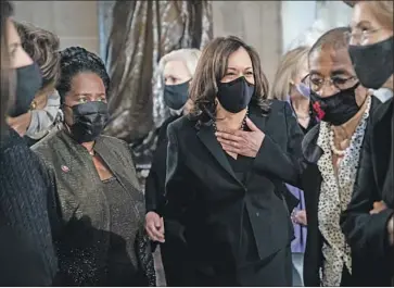  ?? SEN. KAMALA HARRIS, Erin Schaff New York Times ?? center, with other congresswo­men last month at the U. S. Capitol. She has eased the concern of skeptics who worried about her ability to run as vice president, not president.