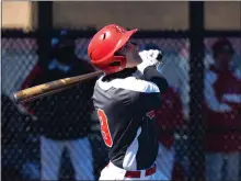  ?? BRIAN FISHER — FOR THE NEWS-HERALD ?? Mentor’s Brayden Bortnick watches a hit against Riverside.