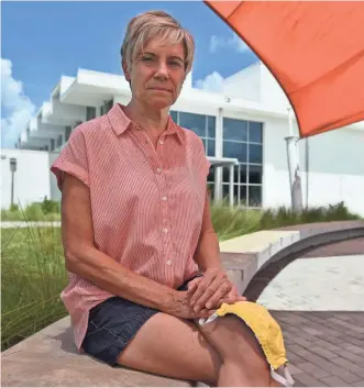  ?? MIKE LANG/USA TODAY NETWORK ?? Christy Karwatt, 62, a social studies teacher at Sarasota High School in Florida, is struggling over whether to go back to work in August.