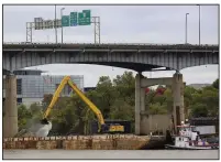  ?? (Arkansas Democrat-Gazette/Staton Breidentha­l) ?? After the ruling Thursday blocking Amendment 91 funding for 30 Crossing, work continued on the first phase of the project under the Interstate 30 bridge between Little Rock and North Little Rock.