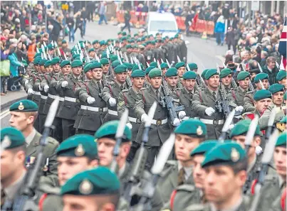  ?? Picture: Paul Reid. ?? A freedom parade by 45 Commando in Arbroath. The future of RM Condor, the base of 45 Commando, has been up in the air for more than a decade.