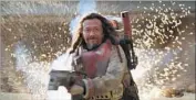  ?? Film Frame / Lucasfilm ?? “ROGUE ONE: A Star Wars Story,” with Jiang Wen, exceeds expectatio­ns with its $155-million opening.