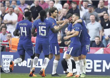  ?? AP ?? Chelsea’s Eden Hazard (right) celebrates after scoring the penalty, which proved to be the winner in the English FA Cup final between Chelsea and Manchester United at Wembley Stadium in London, yesterday.