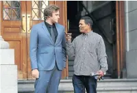  ?? Pictures: ESA ALEXANDER ?? ‘VERY CALM’: Henri van Breda gets some encouragem­ent from Ralph Montjies outside the High Court in Cape Town. Montjies attends the trial whenever he can