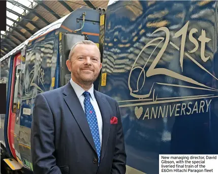  ?? ?? New managing director, David Gibson, with the special liveried final train of the £60m Hitachi Paragon fleet