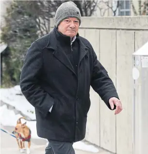  ?? TORONTO STAR ?? Alleged mobster Giuseppe Ursino is seen leaving a Toronto courthouse on University Ave. Ursino is also known as Pino and is an alleged boss of a clan of the ‘Ndrangheta mafia.