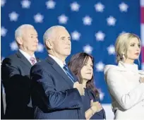  ?? ANDREW HARNIK/AP ?? Vice President Mike Pence, second from left, will visit Nación de Fe church at 4555 West Irlo Bronson Highway in Kissimmee.