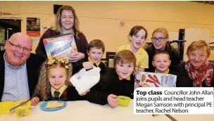  ??  ?? Top class Councillor John Allan joins pupils and head teacher Megan Samson with principal PE teacher, Rachel Nelson