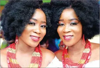  ?? AFP ?? Identical twin sisters Kehinde Olofin (left) and Taye Olofin attend the Igbo-Ora World Twins festival at Igbo-Ora town in Oyo State, Nigeria.