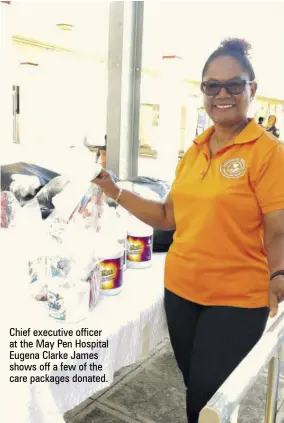  ?? ?? Chief executive officer at the May Pen Hospital Eugena Clarke James shows off a few of the care packages donated.