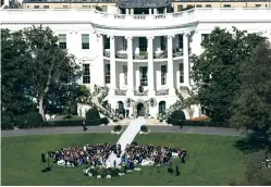  ?? CAROLYN KASTER/ASSOCIATED PRESS ?? President Joe Biden’s granddaugh­ter, Naomi Biden, and her fiancé, Peter Neal, are married Saturday on the South Lawn of the White House in Washington.