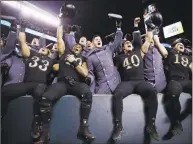  ?? Matt Rourke / Associated Press ?? Army players celebrate their win over Navy on Saturday in Philadelph­ia.