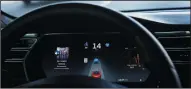  ?? CHRIS WALKER/CHICAGO TRIBUNE ?? The dashboard of the software-updated Tesla Model S P90D shows the icons enabling Tesla’s autopilot, featuring limited hands-free steering, making the Tesla the closest thing on the market to an autonomous-driving enable vehicle.