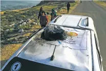  ?? ISMAEL ABU DAYYAH/THE ASSOCIATED PRESS ?? One of the World Central Kitchen trucks wrecked by an Israeli airstrike in the Gaza Strip on Tuesday. Seven aid workers from the internatio­nal charity were killed, leading it to suspend delivery of vital food aid to Gaza.