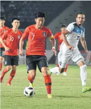  ?? AFP ?? South Korea’s Son Heung-Min, No.7, in action against Kyrgyzstan.