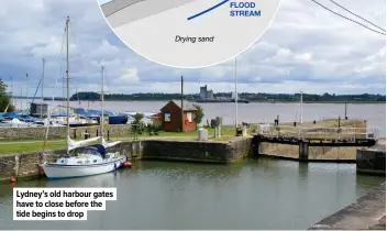  ?? ?? Lydney’s old harbour gates have to close before the tide begins to drop