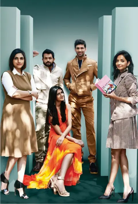  ??  ?? KANIKA SACHDEVA, GAUTAM SINHA, SIDDHARTH DASPAN, MRINALINI CHANDRA, AND (SEATED)
AAVRITI R JAIN COME TOGETHER FOR A SCENE FROM
ORANGE IS THE NEW BLACK
On Kanika: Dress and shirt, designer’s own. Cuff, Eddie Borgo. Shoes, price upon request,...