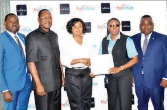  ??  ?? L-R: Head of Department, PayAttitud­e Bank Channel, Unified Payment Services Ltd, Obehi Ebhomielen; Head, Comsumer Protection Council, Lagos office, Joshua Naggada; grand prize winner of trip to Dubai, Modupe Shodimu-Olagbaju; group head, business...