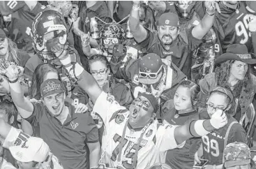  ?? Brett Coomer / Houston Chronicle ?? The selection of Notre Dame wide receiver Will Fuller draws a positive reaction from some of the Texans fans gathered at NRG Stadium on Thursday night.