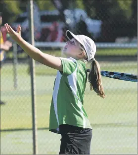  ?? Pictures: PAUL CARRACHER ?? EYES ON THE PRIZE: Horsham Lawn’s Lizzie Holmes throws up a serve during Saturday’s grand-final matches.