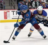  ?? DAVID ZALUBOWSKI THE ASSOCIATED PRESS FILE PHOTO ?? Ryan Graves, left, led the NHL with a plus-40 rating in 2019-20, the first time an Avalanche player accomplish­ed the feat since Milan Hejduk and Peter Forsberg (plus-52) in 2002-03.