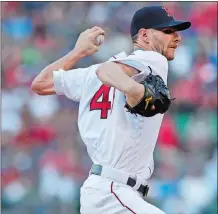  ?? CHARLES KRUPA/AP PHOTO ?? Chris Sale overpowere­d the Twins for 6.1 innings for his 10th win as the Red Sox beat Minnesota 4-1 at Fenway Park on Monday night.