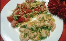  ?? /TNS LINDA GASSENHEIM­ER ?? Herbed Shrimp and Orzo with Fresh Tomatoes: Shrimp flavored with fresh tarragon and lemon juice is a 3-minute dish.