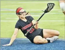  ?? KYLE FRANKO — TRENTONIAN PHOTO ?? Pennington’s Heather Holley slides on the turf as she controls the ball during a MCT quarterfin­al game against Notre Dame.