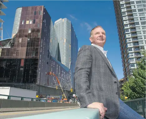  ?? JASON PAYNE ?? Paragon chief executive Scott Menke, seen outside the under-constructi­on Parq developmen­t last week, says the $640-million urban resort is intended to “elevate the experience of this entertainm­ent district” between B.C. Place Stadium and Rogers Arena...